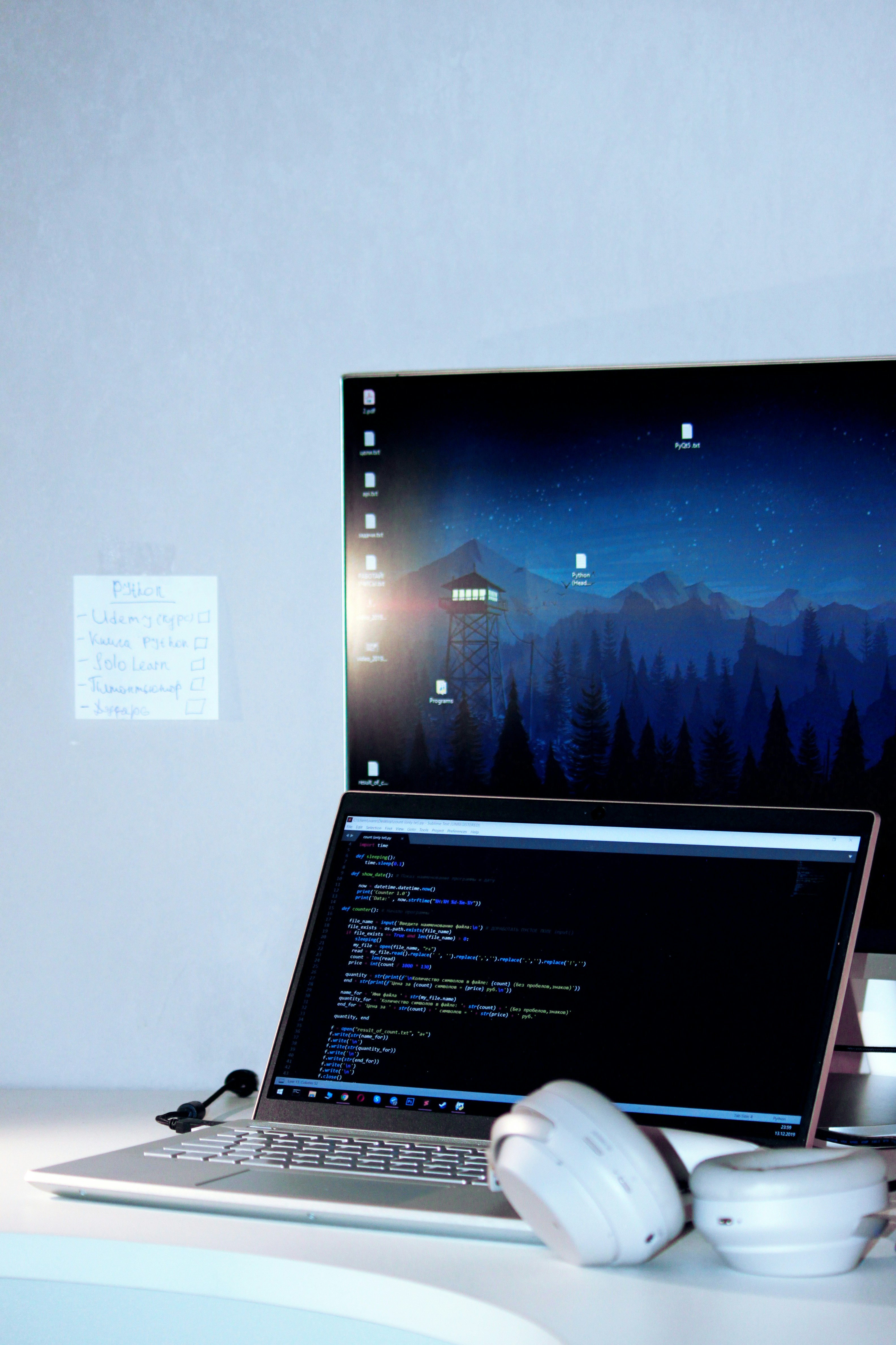 laptop, external screen, and headphone